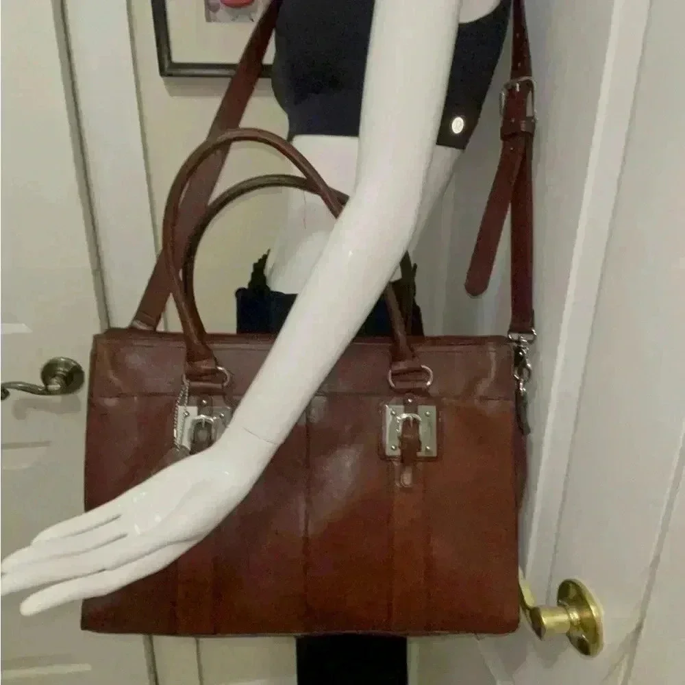 Wilson leather original back, rown color great conditions with adjstbel strap